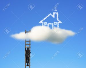 Businessman climbing on wooden ladder to reach cloud house with clear blue sky
